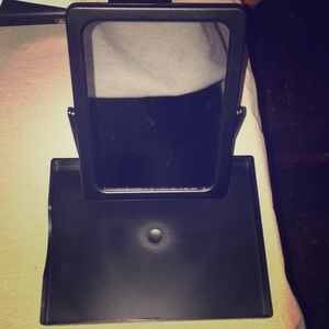 Mary Kay makeup mirror with mesh bag.